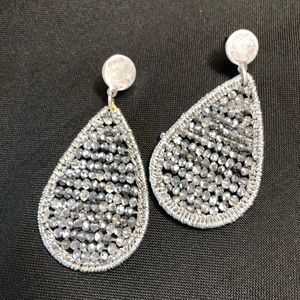Silver beaded earrings.
